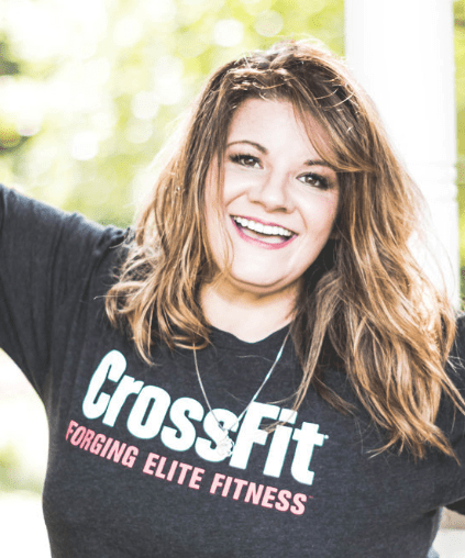 smiling Athena Perez in CrossFit t-shirt